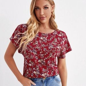 Floral print dolman sleeve top.